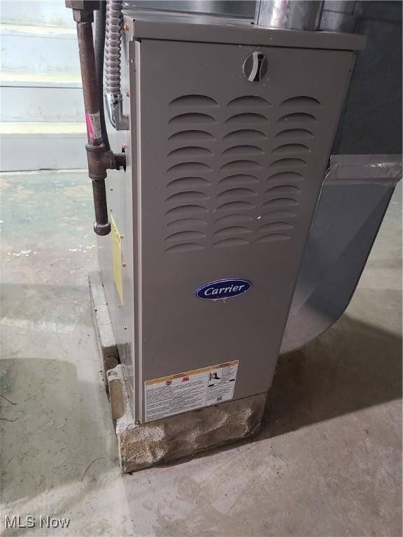 room details with concrete floors and heating unit