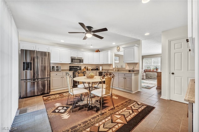 dining area featuring recessed lighting, visible vents, ceiling fan, and light tile patterned floors