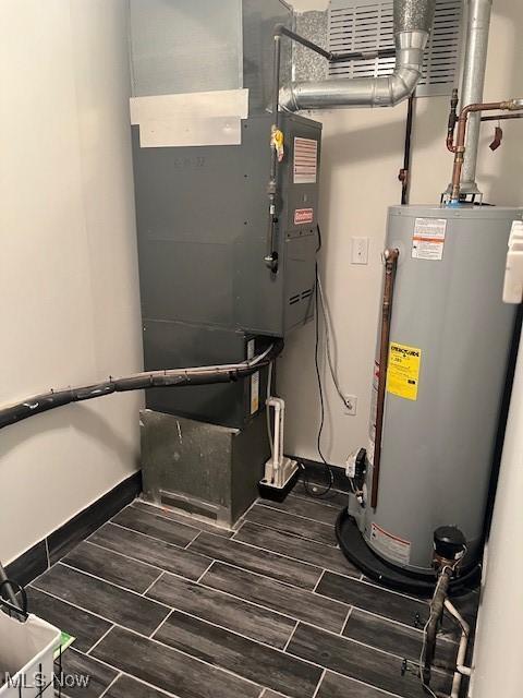 utility room with water heater