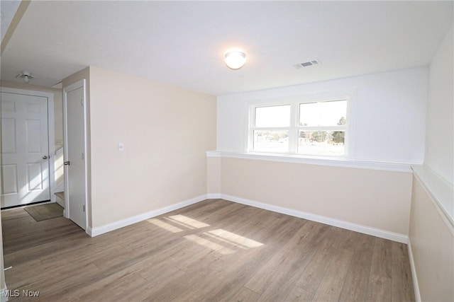 757 Eastern Rd, Doylestown, OH 44230 - unfurnished room with visible vents, baseboards, and wood finished floors