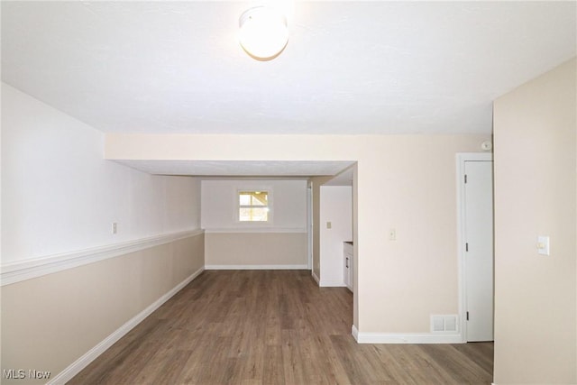 757 Eastern Rd, Doylestown, OH 44230 - unfurnished room featuring wood finished floors, visible vents, and baseboards