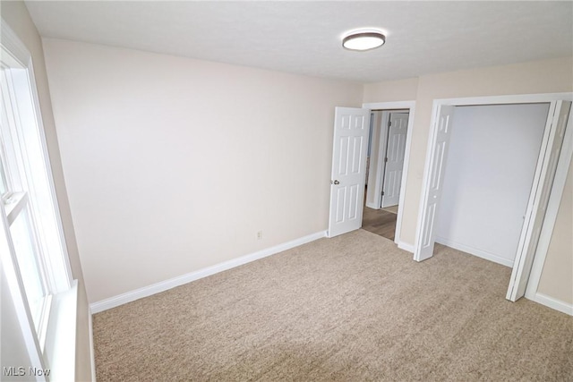 757 Eastern Rd, Doylestown, OH 44230 - unfurnished bedroom with baseboards and carpet floors