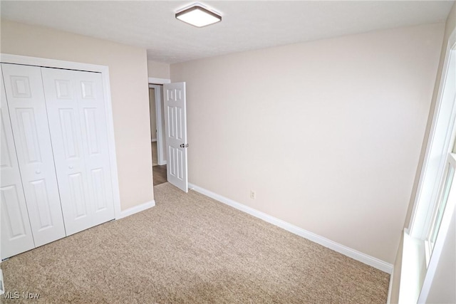 757 Eastern Rd, Doylestown, OH 44230 - unfurnished bedroom with carpet, a closet, and baseboards