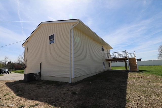 757 Eastern Rd, Doylestown, OH 44230 - view of home's exterior featuring stairway, a deck, and cooling unit
