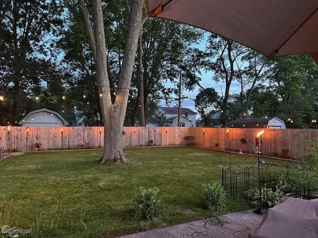 view of yard featuring a fenced backyard