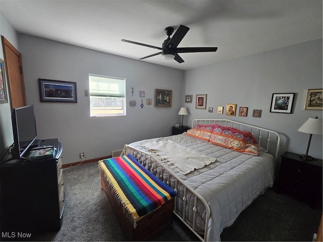 bedroom featuring carpet floors, ceiling fan, and baseboards