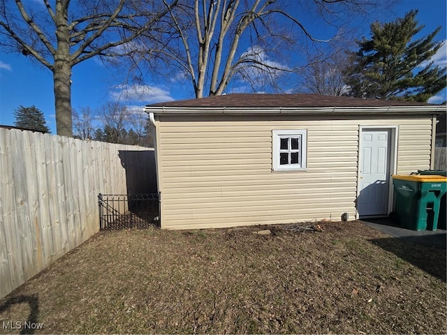 view of outbuilding featuring an outdoor structure and a fenced backyard