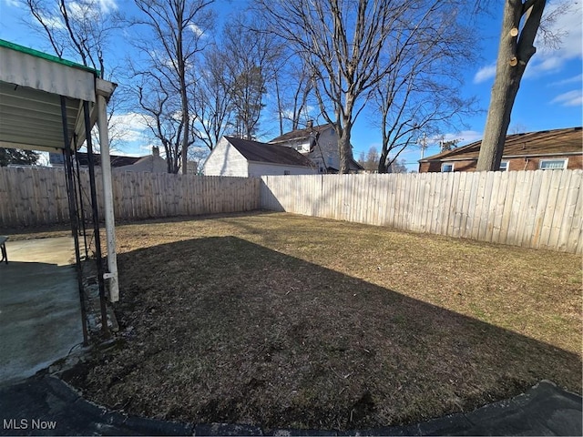 view of yard with a fenced backyard