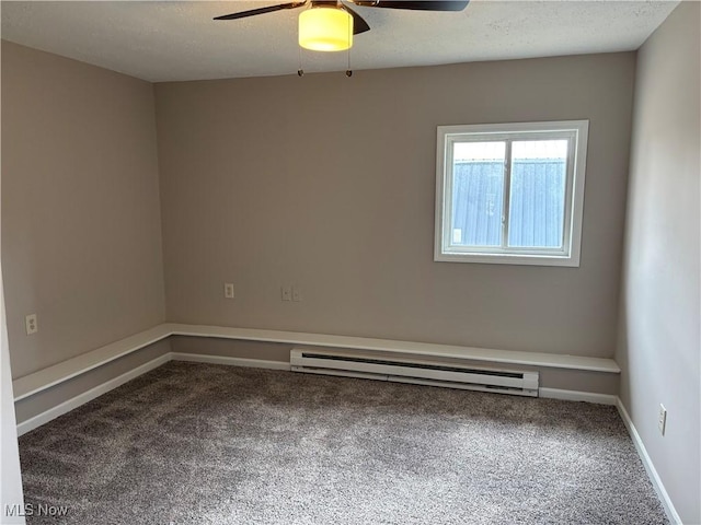 carpeted empty room with a textured ceiling, baseboards, baseboard heating, and a ceiling fan