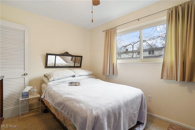 bedroom featuring carpet, ceiling fan, and baseboards