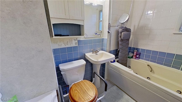 full bathroom with tile patterned flooring, toilet, and tile walls