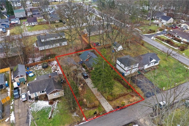 birds eye view of property with a residential view