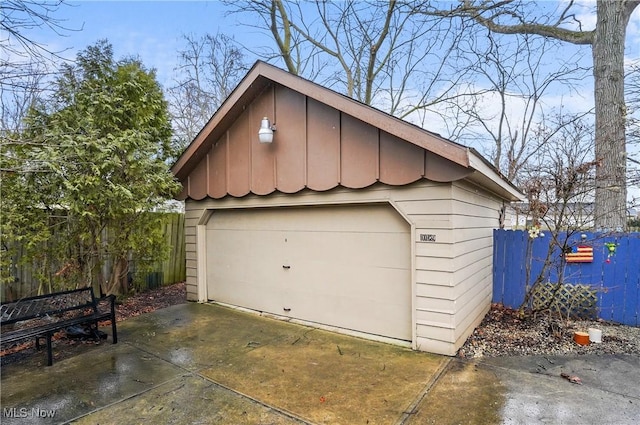 detached garage with fence