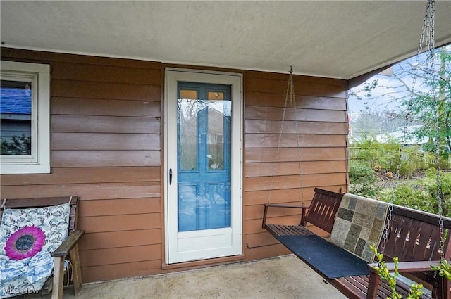 doorway to property with a balcony