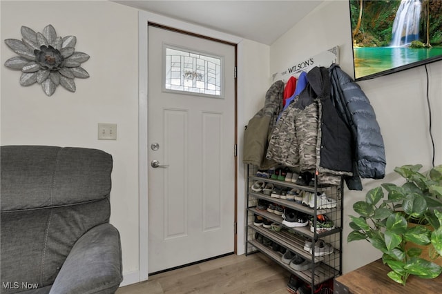 mudroom with wood finished floors