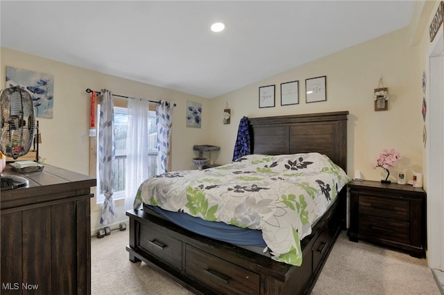 bedroom with recessed lighting, vaulted ceiling, and light colored carpet