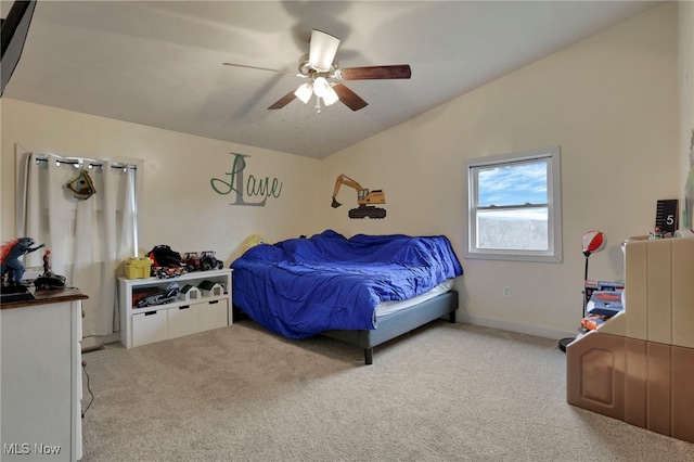 bedroom featuring vaulted ceiling, ceiling fan, and light colored carpet