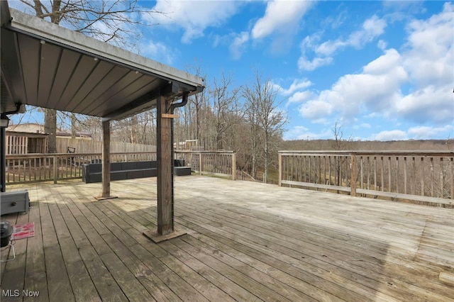 wooden deck featuring fence