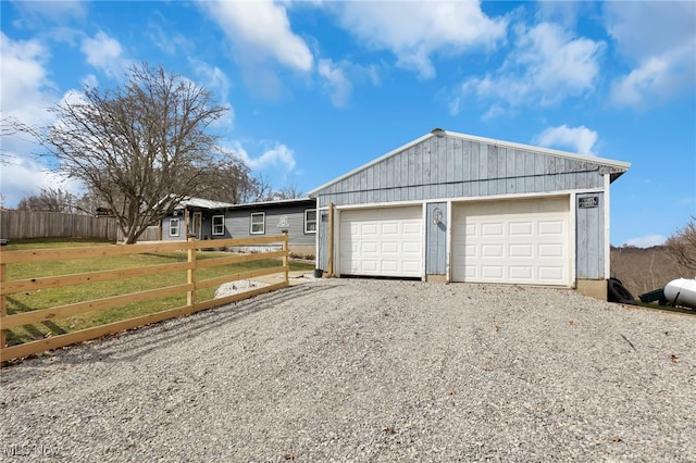 detached garage with fence