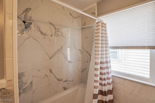 bathroom featuring shower / bath combo