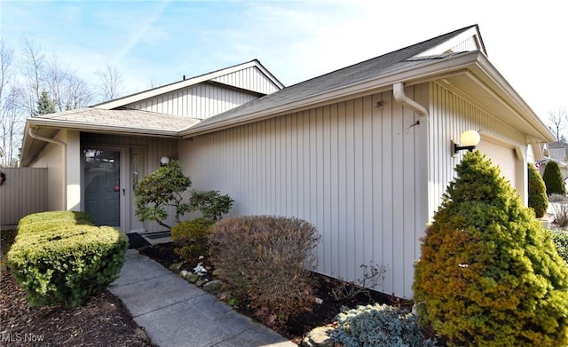 view of property exterior with a garage