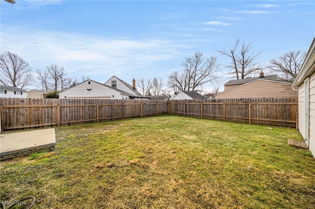 view of yard featuring a fenced backyard