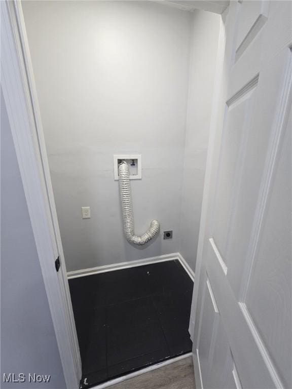 laundry room featuring laundry area, baseboards, wood finished floors, washer hookup, and electric dryer hookup