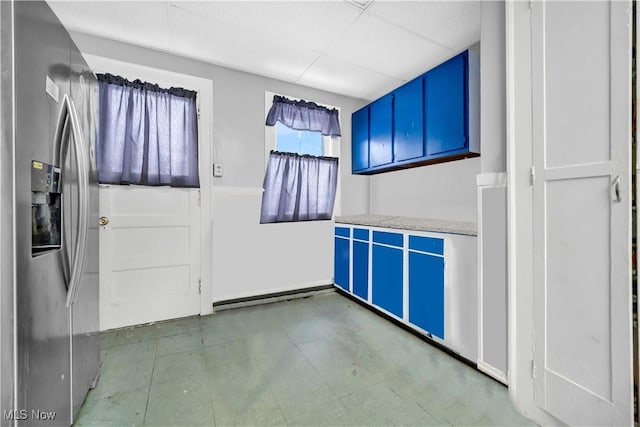 interior space featuring a paneled ceiling