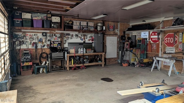 garage featuring a workshop area