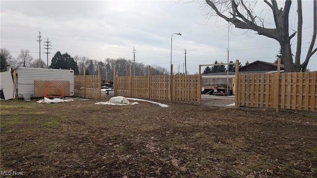 view of yard featuring fence