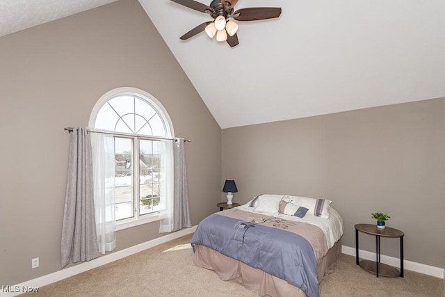 bedroom featuring high vaulted ceiling, carpet, baseboards, and ceiling fan