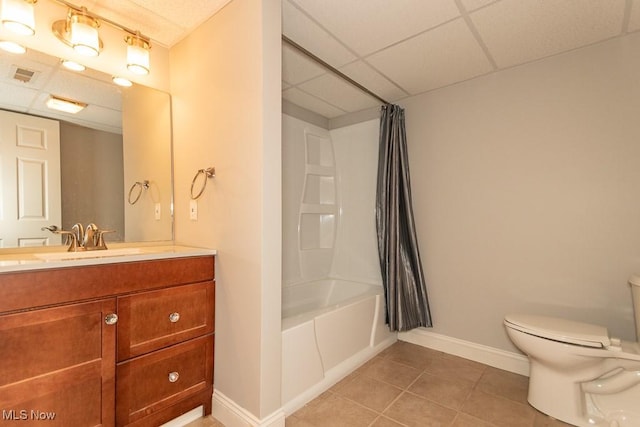 full bath with shower / bath combination with curtain, a paneled ceiling, visible vents, toilet, and tile patterned flooring