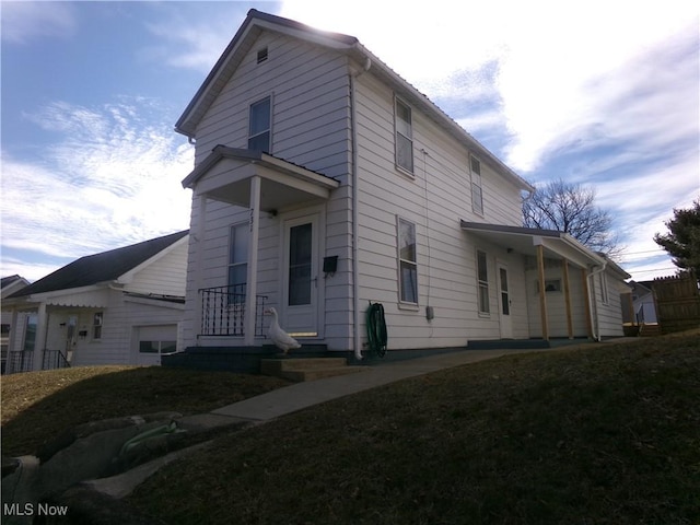 view of home's exterior featuring a lawn