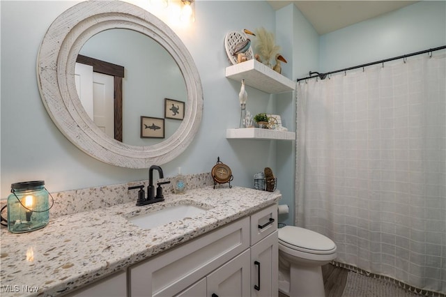 full bath with toilet, wood finished floors, a shower with shower curtain, and vanity