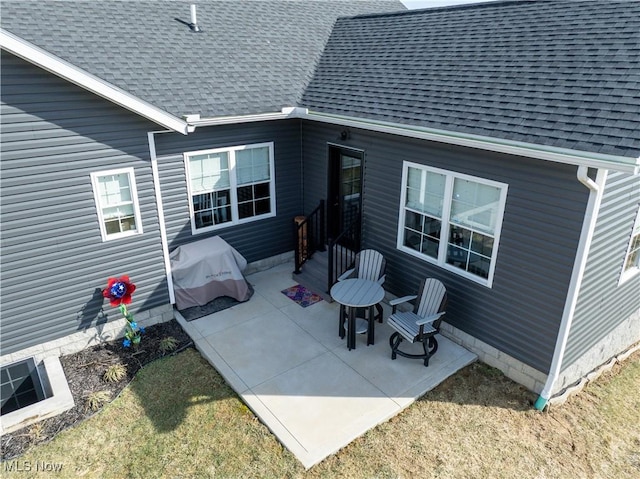 view of patio featuring a grill