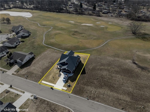 drone / aerial view with view of golf course