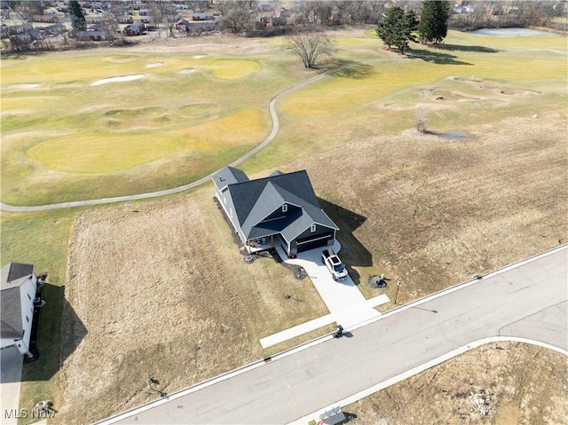 drone / aerial view featuring view of golf course