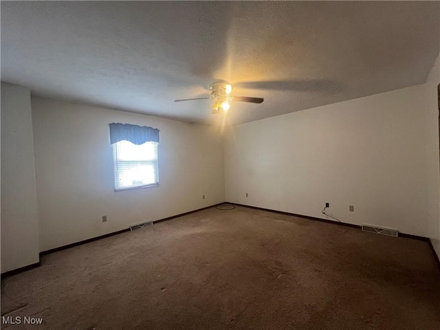924 Nob Hill Dr Unit 3, Niles, OH 44446 - spare room featuring visible vents, light colored carpet, a textured ceiling, and a ceiling fan