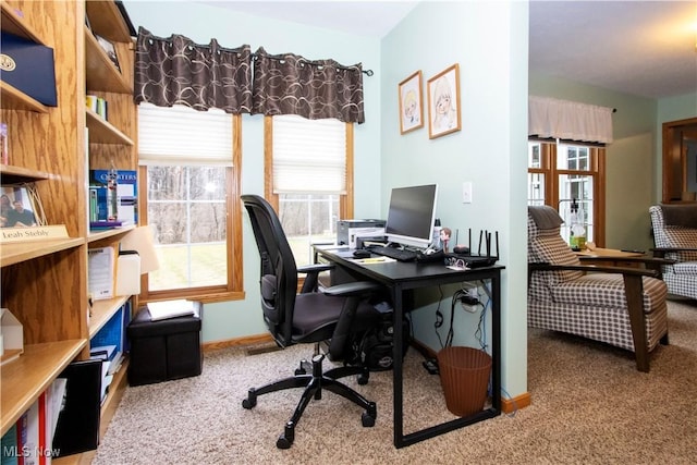 home office featuring carpet floors and baseboards