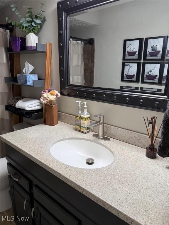 full bathroom featuring vanity