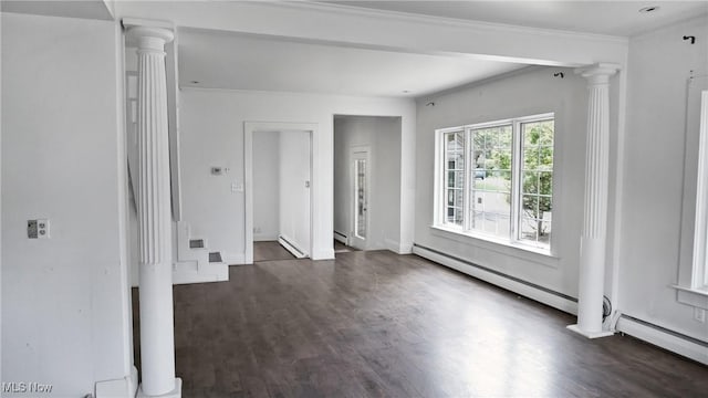 empty room with a baseboard heating unit, a baseboard radiator, dark wood-style flooring, and decorative columns