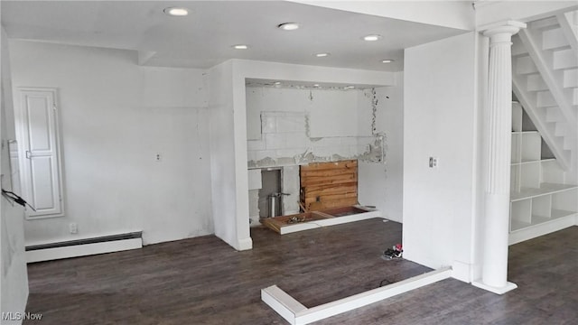 living area featuring a baseboard radiator, recessed lighting, and wood finished floors