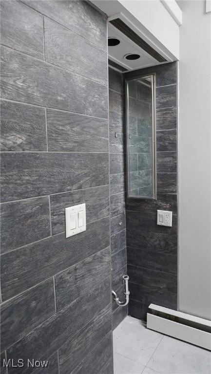 bathroom with tile patterned floors