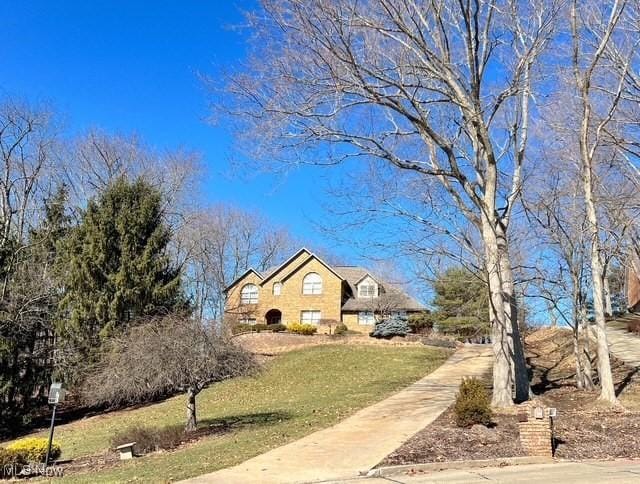 view of front of property with a front lawn