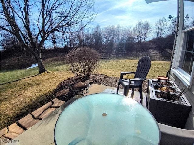 view of patio featuring outdoor dining area