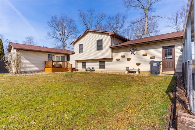 14045 Mahoning Ave, Lake Milton, OH 44451 - back of property with a deck, a yard, and fence