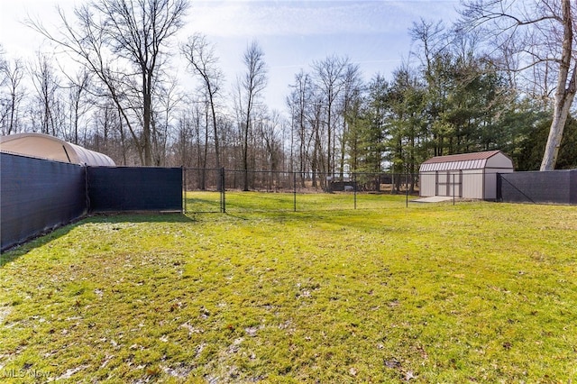 14045 Mahoning Ave, Lake Milton, OH 44451 - view of yard featuring fence, an outdoor structure, and a storage unit