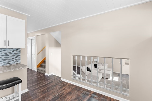 14045 Mahoning Ave, Lake Milton, OH 44451 - interior space featuring dark wood-style floors, stairs, and baseboards