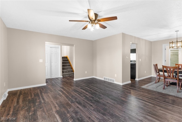 14045 Mahoning Ave, Lake Milton, OH 44451 - interior space featuring dark wood-style flooring, visible vents, stairway, and baseboards