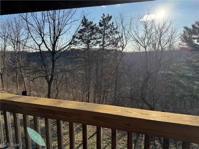 view of mountain feature with a forest view